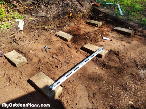 Fitting-the-concrete-blocks---firewood-shed