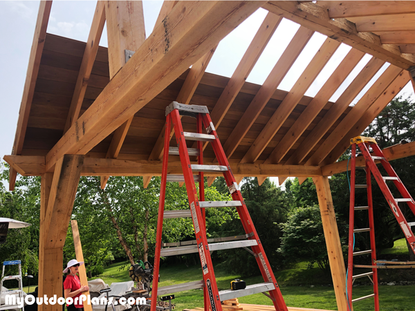 Attaching-the-roof-boards-to-the-outdoor-pavilion