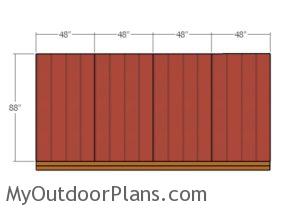 fiting-the-siding-panels-to-the-back-of-the-shed