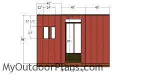 Side wall with door siding panels