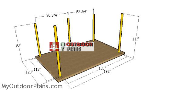 Fitting-the-posts-for-the-10x16-run-in-shed