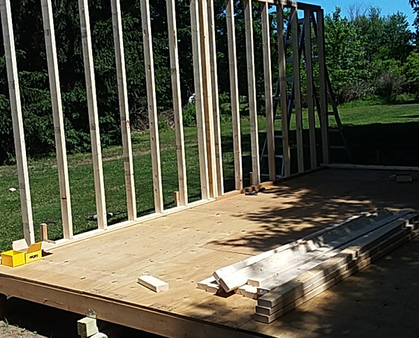 Fitting-the-wall-frames-to-the-16x20-barn-shed