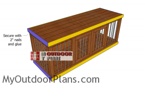 Fitting-the-trims-to-the-wooden-dog-kennel