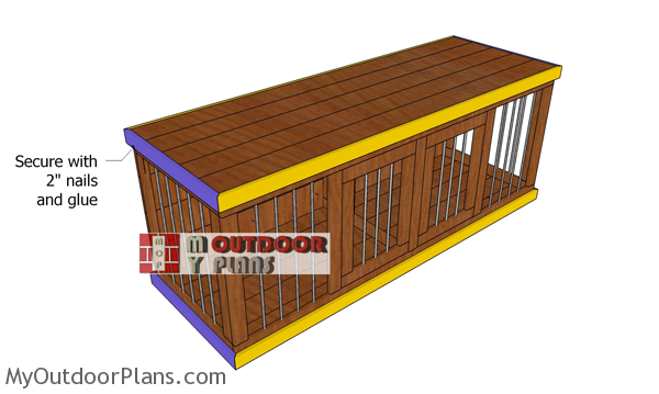 Fitting-the-trims-to-the-wooden-dog-kennel